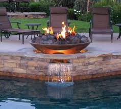 Bond gas fire pit with water fountain. Fire As The Focal Point Aqua Magazine