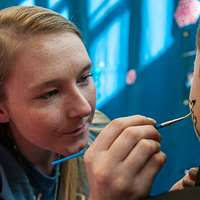 Master-at-Arms Seaman Recruit Taylor Holly grinds through