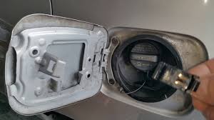 Underneath the door is a gas cap. Fix Toyota Fuel Door Spring Youtube