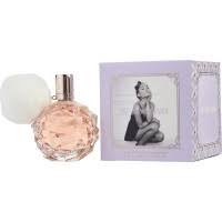 The sleek modern bottle with subtle blue glow rests in a soft, animated white, puffy cloud base. Parfums Ariana Grande Sobelia