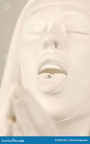 Nun Statue with Tongue Pierced Stock Photo 