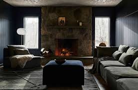 In any room it occupies and at any time of year, a fireplace commands attention—but even more so in winter, when it's often animated with a crackling fire to warm chilled bones. 23 Living Rooms With Fireplaces Made For A Night In