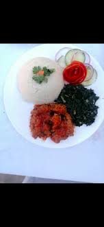Maybe you would like to learn more about one of these? An African Meal Ugali With Beef Stew Served With Greens Mnc