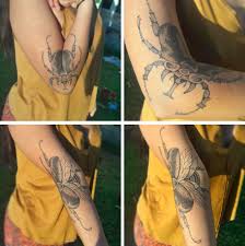 A Beetle Tattoo Spreads Its Wings In Tandem With Its Owner S Arm Colossal Beetle Tattoo Elbow Tattoos Bug Tattoo We know you are not a fan of beetles, but after checking this beetle design, you will. beetle tattoo elbow tattoos