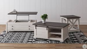 Minimalist coffee table with lift top unit: Dorrinson Two Tone Lift Top Coffee Table From Ashley Coleman Furniture