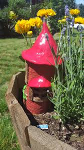 You'll be cutting glass bottles and also learning about the easiest way to remove bottle labels from glass bottles in this article. Diy Fairy House Water Globes Made From Wine Bottles She S One Crafty Mom