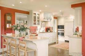 Kinda Like The Splash Of Color Traditional White Kitchen Cabinets C Crown Point Cab White Kitchen Traditional Traditional White Kitchen Cabinets Coral Kitchen