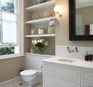 Concealed cistern with shelves / cupboard above?