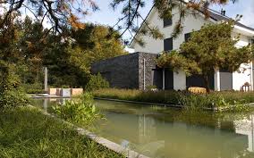 Unlike standard landscaping, which mainly deals with flora & fauna, modern landscaping relies on additional components as well. Thoroughly Modern House And Splashy Garden By Jacques Van Leuken Stylish Eve