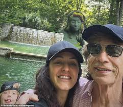 Mick Jagger, 81, joins girlfriend Melanie Hamrick, 37, and lookalike son  Deveraux, 8,