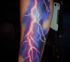 A double lightning bolt tattoo meant that a person is a white supremacist. 60 Lightning Tattoo Designs For Men High Voltage Ideas Lightning Tattoo Lightening Tattoo Purple Tattoos