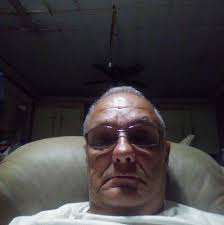 How to remove a stuck water pump from a Suzuki GT750 engine?