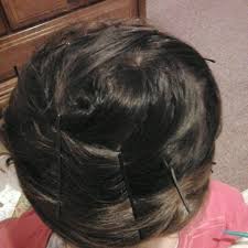 Loop the ponytail around the hair tie in a ballerina bun, secure it with a hair tie, and wait for the hair to dry. 22 No Heat Styles That Will Save Your Hair