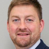 Trojan alum Lyle to lead Carrollton High