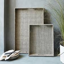 Care instruction for open weave rattan laundry basket. Woven Serving Trays