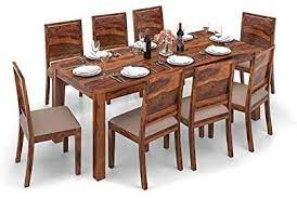 Seating eight and made from dark and durable indian sheesham wood, it comes with a choice of chairs so you can pick which best suits your taste. Nisha Furniture Sheesham Wood Dining Table 8 Seater Dinning Room Furniture With 8 Chairs Cream Cushion Natural Teak Finish Amazon In Home Kitchen