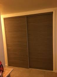 Sliding closet doors will give the illusion of spaciousness. Updated My Mirrored Closet Doors By Covering Them With Grass Cloth Wallpaper Love The Finished Mirror Closet Doors Closet Doors Mirrored Closet Door Makeover