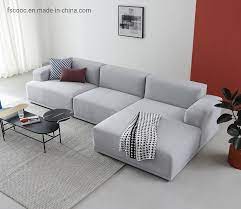 The tv wall was clad in wash gray white ceramic tiles with rough texture giving it a concrete like finish. China Modern Home Living Room Furniture Set Grey Velvet Fabric Corner Sofa China Two Seater Sofa Drawing Room Sofa