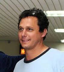 Who is the famous person in this picture from Huntington and what was is  nick name, where did he go to college, what video game was he in and the  team he