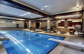 50 Indoor Pool Ideas Swimming In Style Any Time Of Year Small Indoor Pool Indoor Pool Design Indoor Swimming Pool Design