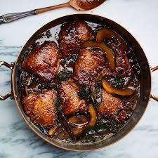 Braised Chicken Thighs With Squash And Mustard Greens Recipe Braising Recipes Braised Chicken Dutch Oven Recipes