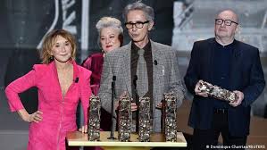 Corinne masiero stripped live onstage at the cesar film awards in paris to demand more support for france's cultural sector. Kb74jlja Vxalm