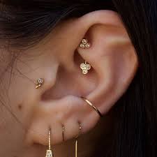 pin by 𝓐𝓷𝓪 𝓕𝓵𝓪𝓿𝓲𝓪 ferreira martins on ocs in 2021 rook jewelry earings piercings ear jewelry