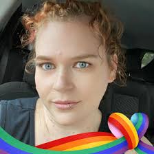 What is the identity of the figure in the photo taken in the attic at  Mansfield?