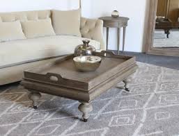 Topped with sturdy concrete and set on solid wood, our portside round concrete coffee table. Weathered Oak Coffee Table