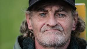 Beggars and businesses both in 'survival mode'