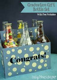 College graduation gifts are pretty common—who doesn't want to wish the young adults in their life good luck as they polish their graduation cap ideas and start life after college?—but all too often, those gifts for college grads turn into checks, cash, and gift cards. Graduation Gift Bottle Set Busy Mom S Helper Creative Money Gifts Graduation Gifts For Guys Unique Graduation Gifts