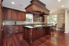 Cherry Wood Is Featured In This Magnificent Kitchen Plus The Red Mahogany Kitchen Cherry Wood Kitchens Kitchen Paint Colors With Cherry Cherry Cabinets Kitchen