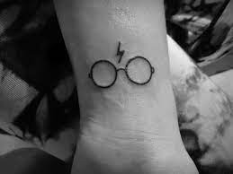 Whether you want a tiny deathly hallows symbol or a massive hogwarts sleeve, let these harry potter tattoos inspire your own ink find and follow posts tagged harry potter tattoos on tumblr. 20 Awesome Minimalist Harry Potter Tattoos
