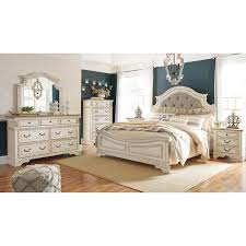 This is a whimsical and airy style with bright colors, a touch of floral patterns. Realyn B743 7 Pc Queen Upholstered Panel Bedroom Set Signature Design By Ashley Bedroom Today Furniture