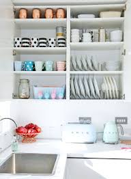 organised kitchen cupboard: mugs and
