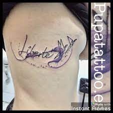 Tattoos, piercings, airbrush, custom works, freehand, clothes and many more. Tatuaje Libertad Acuarela Pupa Tattoo Granada Body Art Tattoos Tattoos Tattoo Lettering