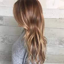 Give honey blonde hair with caramel swirls a whirl! How To Get Sunny Blonde Hair No Matter The Weather Outside Hair Com By L Oreal