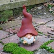 Garden gnomes have a long and interesting history since originally being discovered in the 1800s. Terracotta Modern Gnome Garden Ornament In Redcpodria Hacerse Con Calabaza Y Papel Mache Gnome Garden Garden Ornaments Gnomes