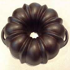 I had always wanted a cast iron bundt cake pan and well, i was more than happy to purchase lodge's fluted cake pan; Lodge Fluted Cake Pan 13 Cups 10 Diameter With Flush Surface Handles Markings Can Include A Single Cast Iron Cooking Cast Iron Cookware Cast Iron Skillet