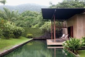 .modern villa inside | a contemporary villa with dual height open plan living space, a gym and a private swimming pool. This Is An Indian House According To One Architect The New York Times