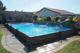 Above Ground Swimming Pools Built From Resin Materials Have A Distinct Benefit Over Steel Or Aluminum Diy Swimming Pool Pool Landscaping Swimming Pool Designs