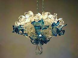 Made of iron and clear glass. Crystal Blue Blown Glass Chandelier Artisan Crafted Lighting