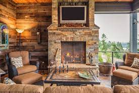 Should your seating face the not all stacked stone fireplaces are made from stone cut into brick shapes. Brick Vs Stone Fireplace Pros Cons Comparisons And Costs