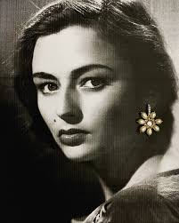 Marina Berti, an Italian actress born in 1924, was known for her roles in  films like Quo Vadis (1951), Ben-Hur(1959), and Cleopatra (1963). Kundan  polki , freshwater pearl loop drop earrings in