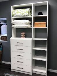 With glass doors and drawer fronts, shoe storage, center island, granite. Closets Systems Closet Organizers You Ll Love Miller S Murphy Bed And Home Offices Link To Home Page