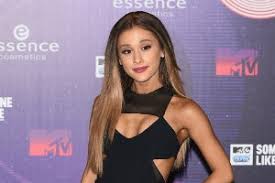 Nonetheless, it is oriental men are often blessed with thick straight hair, so the center parting is easy to obtain and design. Ariana Grande Middle Part Hairstyle Mtv Ema Celebrity Hair Teen Vogue