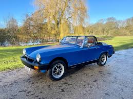 Image result for Tahiti Blue 1977 MG