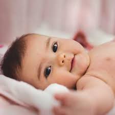 Super cute face with curly lock of hair on its head, and adoring smile. Cute Baby Girl Whatsapp Dp