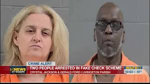 Two people arrested in fake check scheme, authorities say