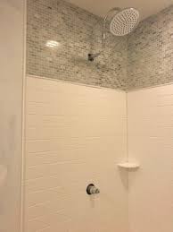 In the usual scenario i usually explain the difference between what they have 4 tile with old. Solid Surface Shower With Accent Tile